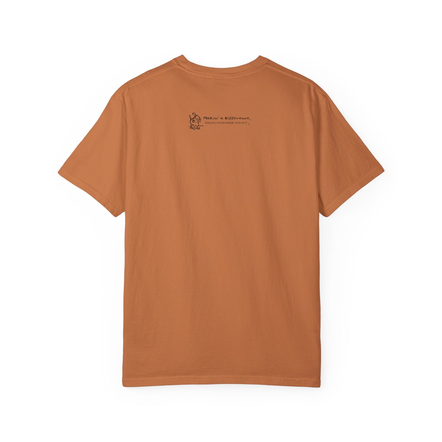 Dark orange or yam coloredt-shirt viewed from the back, featuring small black text and a simple cartoon graphic centered near the upper back. The text reads “Makin’ a Difference. makinadifference.com” with line below "Feeling Good Inside & Out" with a small illustration of a dog next to it.