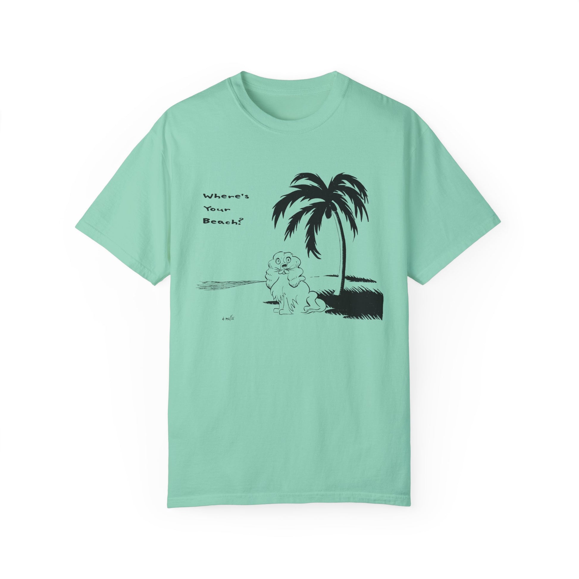 Greenish tinted blue unisex t-shirt featuring a playful black line illustration of a fluffy cocker spaniel dog sitting on a beach under a palm tree with the phrase “Where’s Your Beach?” written beside it.