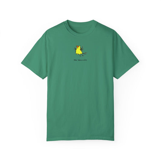 Green t-shirt featuring a small, centered linocut-style illustration of a happy looking flying yellow bird with an orange beak.  Below the artwork is the phrase “No Worries.”