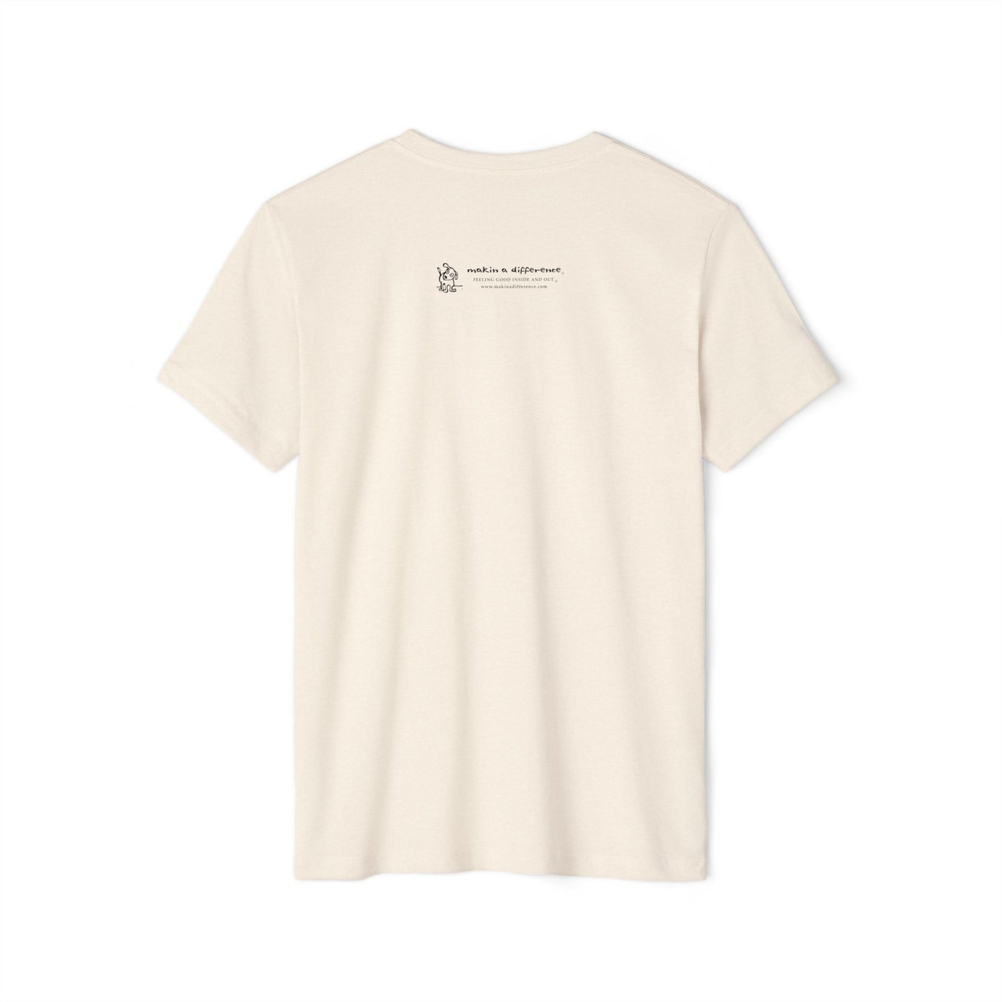 Off white t-shirt viewed from the back, featuring small black text and a simple cartoon graphic centered near the upper back. The text reads “Makin’ a Difference. makinadifference.com” with line below "Feeling Good Inside & Out" with a small illustration of a dog next to it.