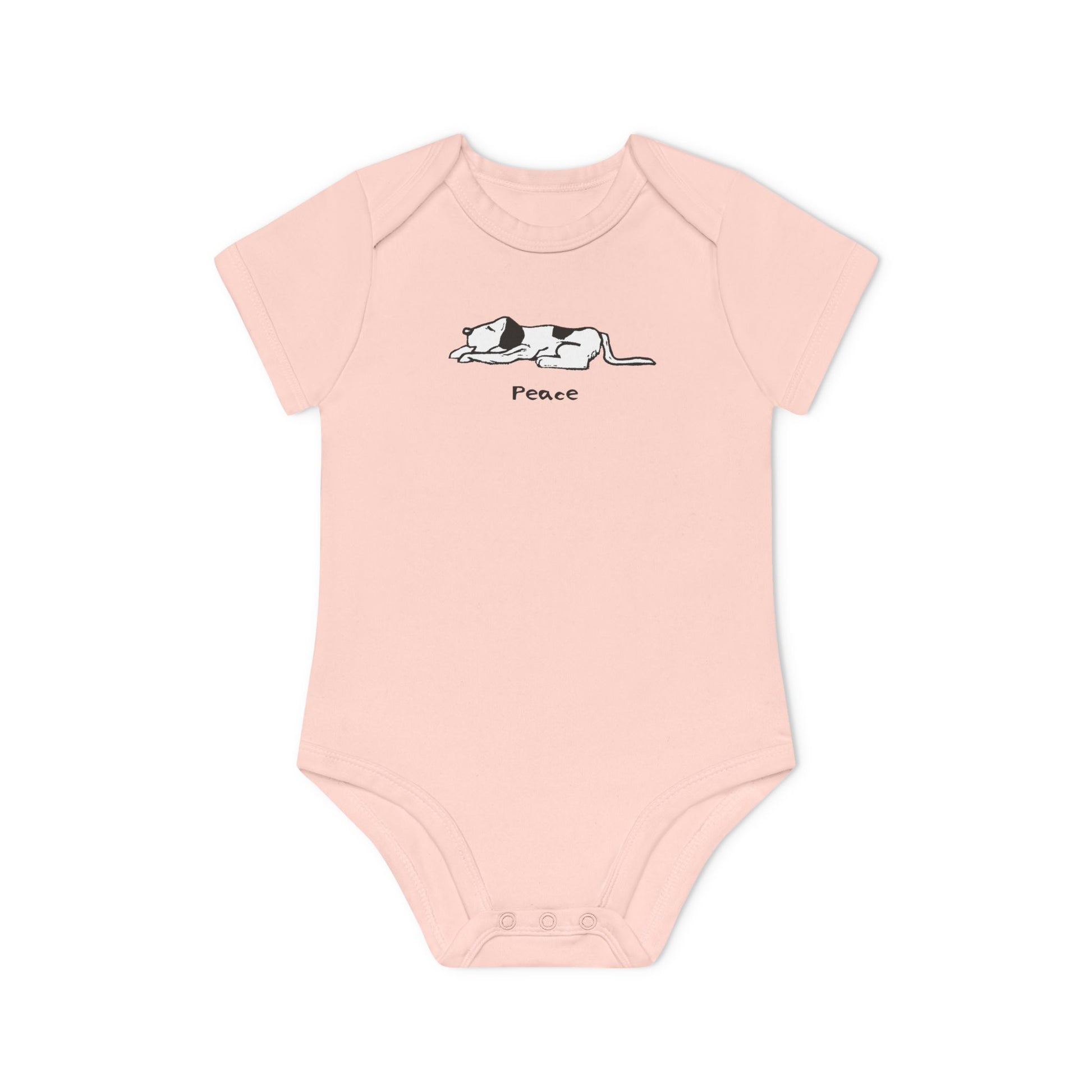 Light pink short sleeve onesie baby bodysuit featuring a simple black and white illustration of a sleeping dog above the word "Peace" printed on the chest.
