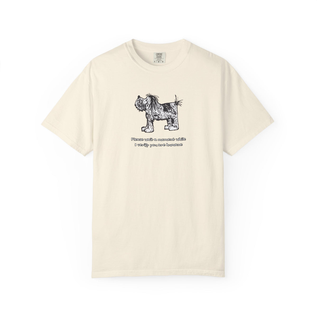 Comfort Colors unisex ivory, off-white short-sleeve crew neck T-shirt featuring shaggy dog artwork from an original linoleum block print by Barry Nelles, with the humorous text “Please wait a moment while I verify you are humane” printed below the image. Makin’ a Difference.