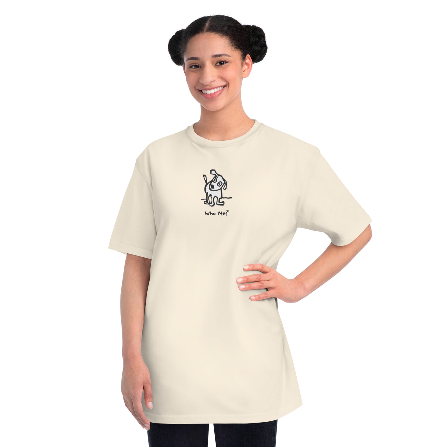 Woman in natural off white organic unisex t-shirt featuring a playful, cartoon-style dog with one ear raised and a wagging tail, with the caption “Who Me?” printed below—a fun eco-friendly graphic tee for dog lovers.