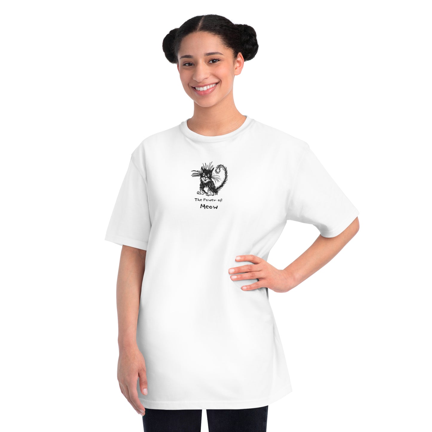 Woman standing wearing white organic unisex t-shirt featuring a humorous cartoon cat design with the text “The Power of Meow,” perfect for cat lovers.