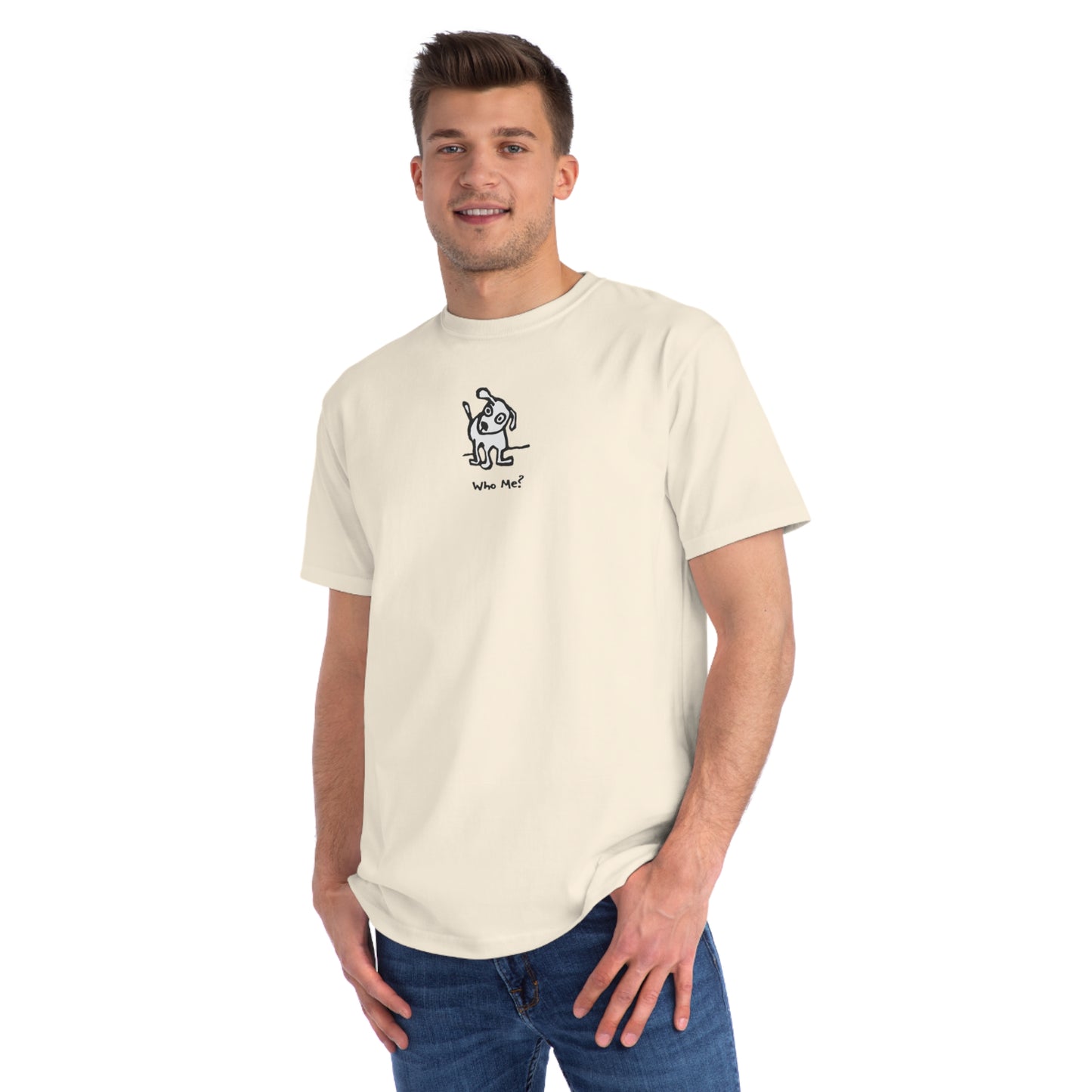 Man in natural off white organic unisex t-shirt featuring a playful, cartoon-style dog with one ear raised and a wagging tail, with the caption “Who Me?” printed below—a fun eco-friendly graphic tee for dog lovers.