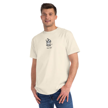 Man in natural off white organic unisex t-shirt featuring a playful, cartoon-style dog with one ear raised and a wagging tail, with the caption “Who Me?” printed below—a fun eco-friendly graphic tee for dog lovers.