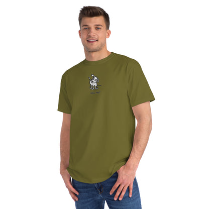 Man in olive green organic unisex t-shirt featuring a playful, cartoon-style dog with one ear raised and a wagging tail, with the caption “Who Me?” printed below—a fun eco-friendly graphic tee for dog lovers.