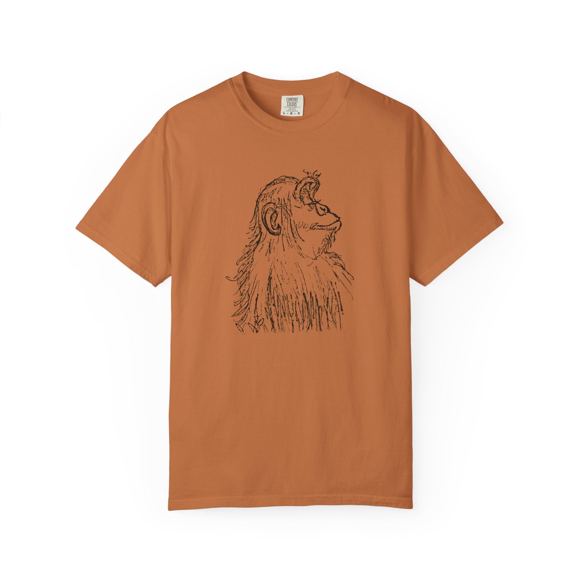 Front of yam colored Comfort Colors T-shirt 'Embrace the Monkey Mind' with black sketch of an ape in profile looking right
