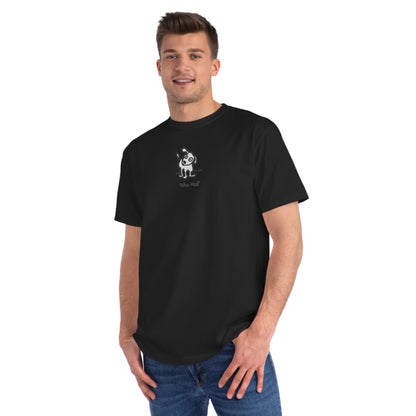 Man in black organic unisex t-shirt featuring a playful, cartoon-style dog with one ear raised and a wagging tail, with the caption “Who Me?” printed below—a fun eco-friendly graphic tee for dog lovers.
