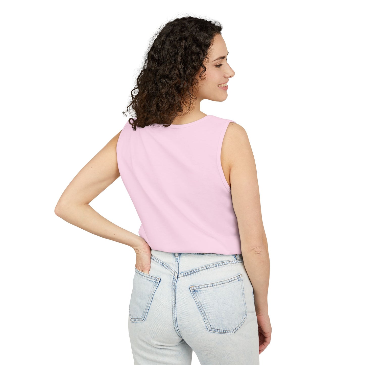 Back of woman wearing light pink tank top.